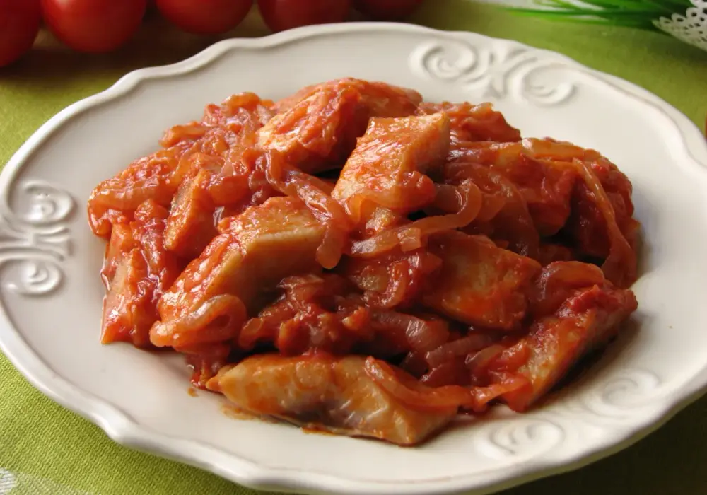 Śledzie w pomidorach - przepis na idealny smak!